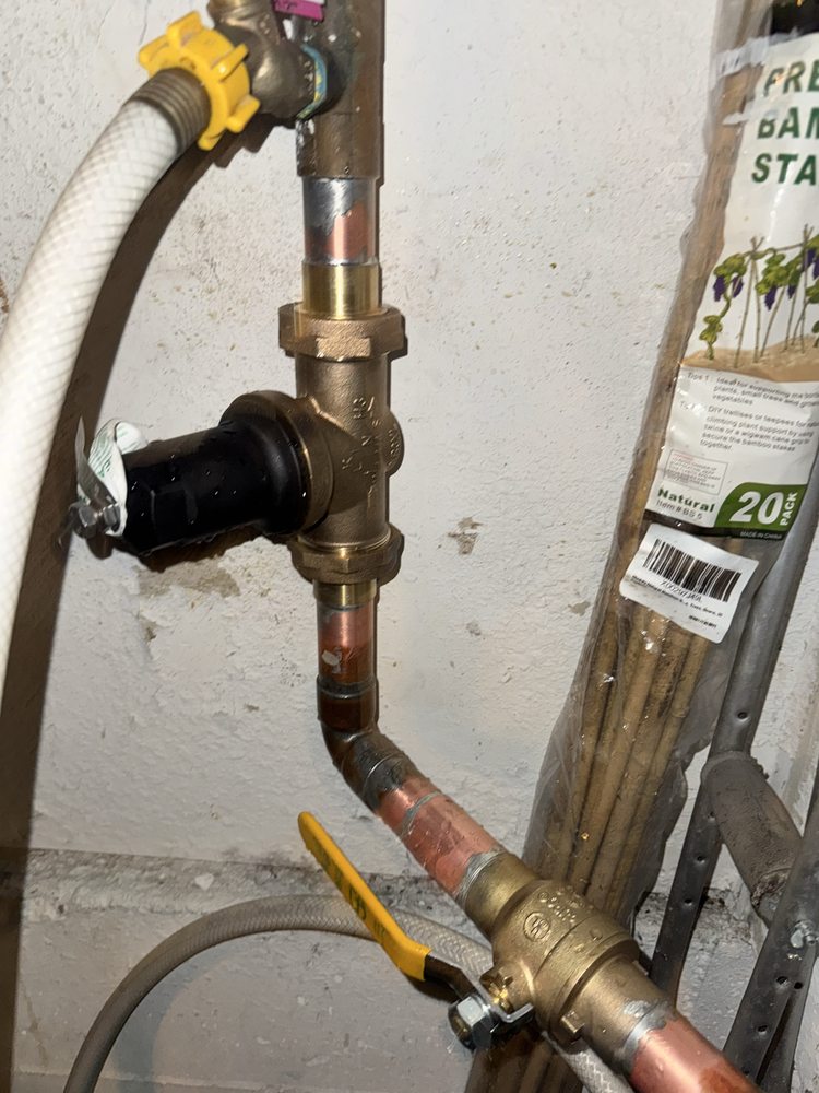 Backflow preventer installation on copper hose bib line