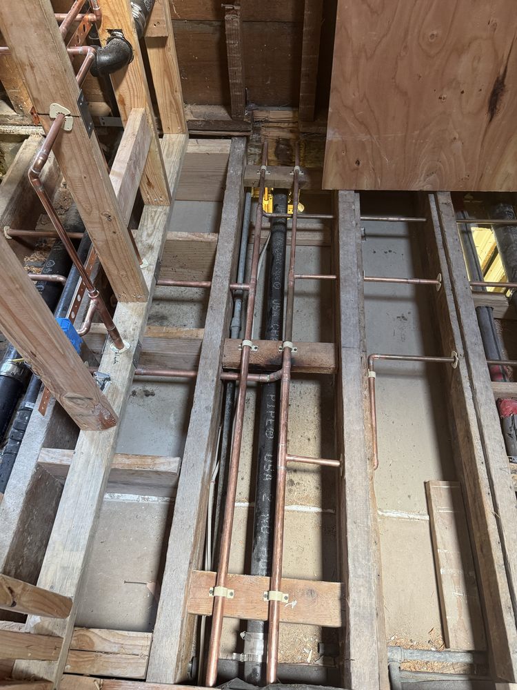 Newly installed copper repiping with expansion tank in a Chicago home