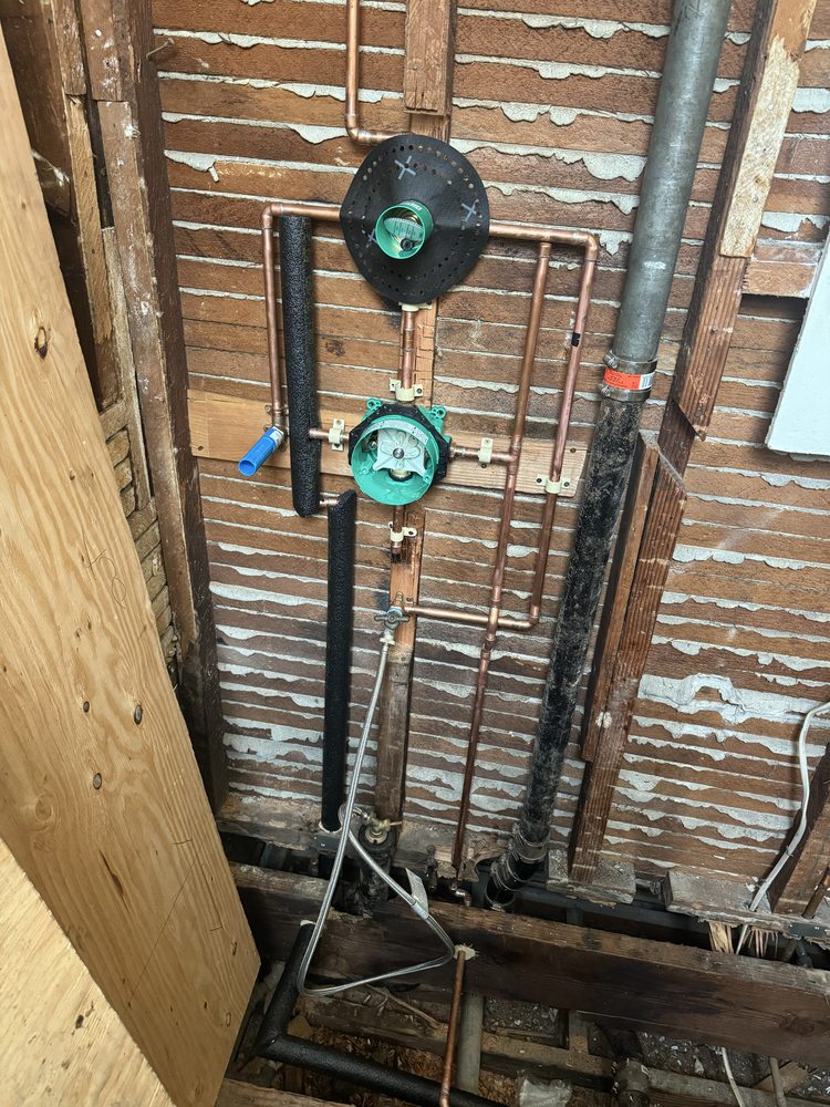 Copper repipe manifold with pressure balance valve and water hammer arrestors